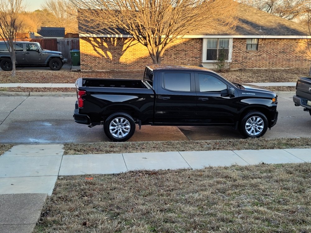 Professional detailer working on a car
